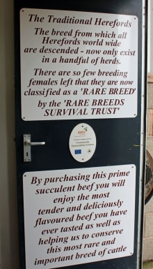 Door with text on about Rare Breeds and Traditional Herefords